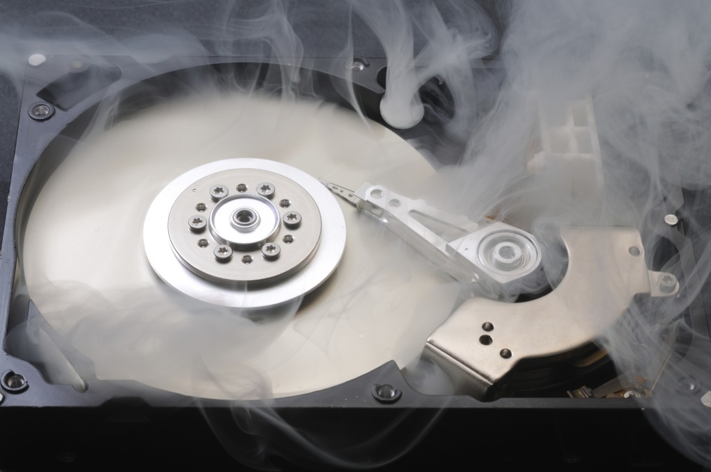 close up of hard disk in smoke